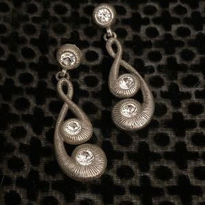 Brighton swirl design post earrings with crystal detail.
